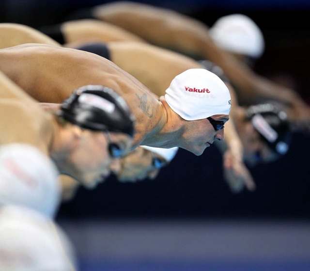 Die US-amerikanischen Schwimmstars Rya...uf dem Sprung bei der WM in Schanghai   | Foto: DPA