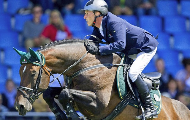 Weiterhin in prchtiger Form: Hans-Die...nd der Weltklasse-Hengst Magnus Romeo   | Foto: DPA