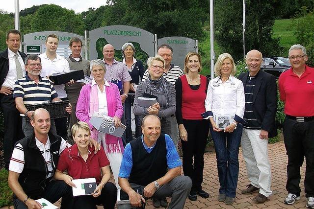 Autoschau beim Golfen