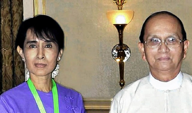 Nicht entspannt: Aung San Suu Kyi und Thein Sein   | Foto: DPA