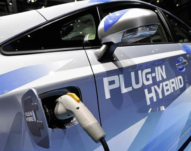 Der Toyota Prius ist ein Hybridauto, d... der Steckdose aufgeladen werden kann.  | Foto: AFP