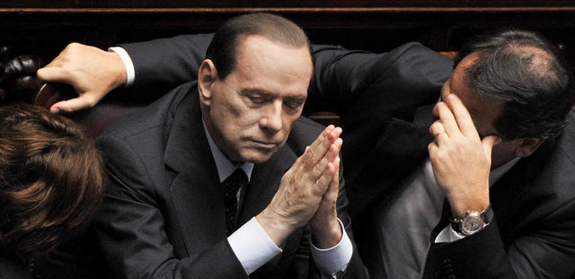 Ministerprsident Silvio Berlusconi whrend der Abstimmung   | Foto: AFP