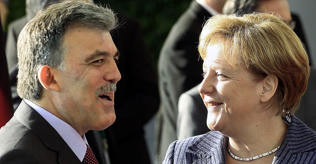 Der trkische Prsident  Abdullah Gl mit Angela Merkel  | Foto: dpa