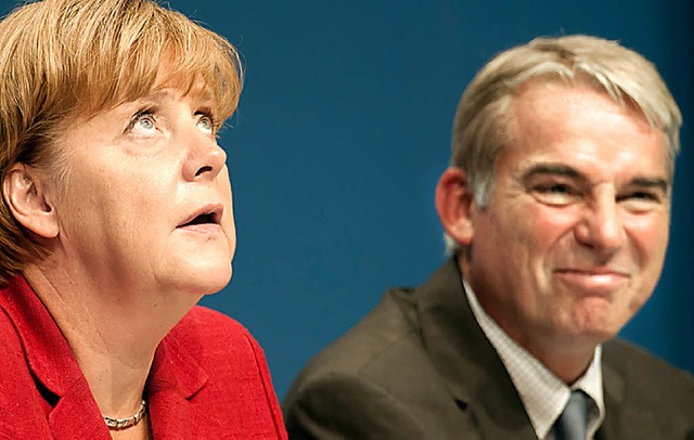Chefin mit Landesvorsitzendem: Angela Merkel und Thomas Strobl   | Foto: DAPD