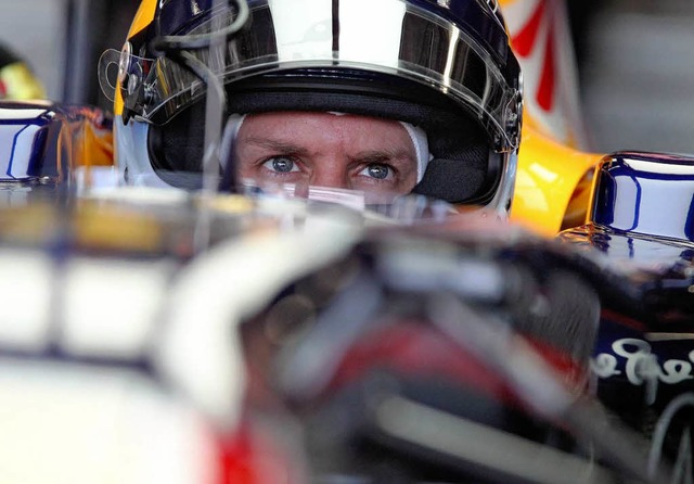 Sebastian Vettel begreift seinen Sport... und ohne Freundin in der Boxengasse.   | Foto: dpa