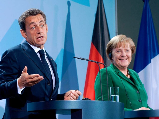 Frankreichs Staatschef Sarkozy und Kanzlerin Merkel  sind nicht einer Meinung  | Foto: dpa
