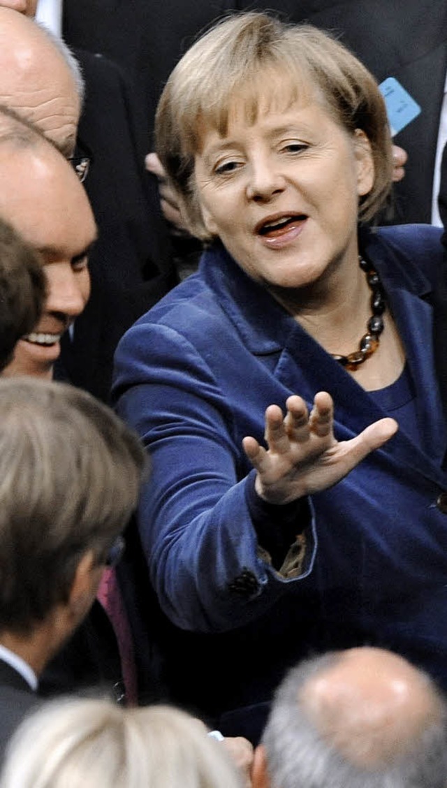 Kanzlerin Angela Merkel bei der Abstimmung ber die Eurorettung  | Foto: dpa