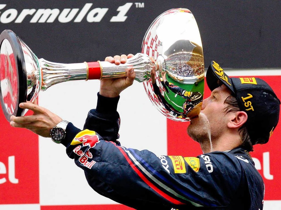 Prost! Sebastian Vettel fuhr seinen 11. Saisonerfolg ein.  | Foto: dpa