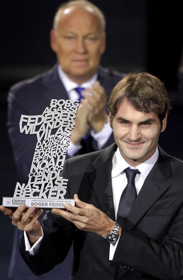 Roger Brennwald, Chef der Swiss Indoor...nd sein Lieblingsspieler Roger Federer  | Foto: afp