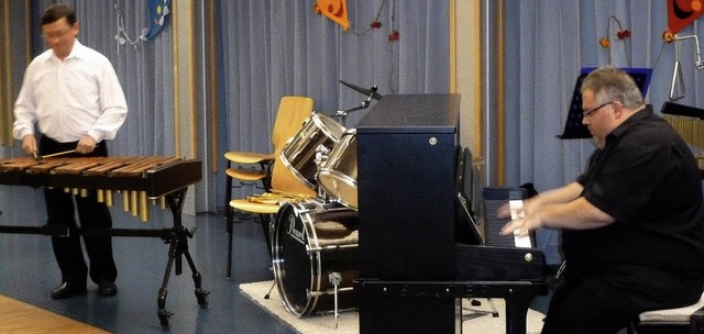Ein Hhepunkt beim Herbstkonzert der A... (links) und Michael Huck am Klavier.   | Foto: Eberhard Gross