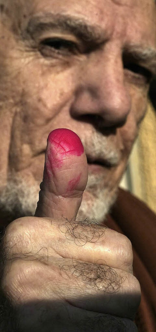 Er hat schon abgestimmt: ein Whler  in Kairo   | Foto: AFP