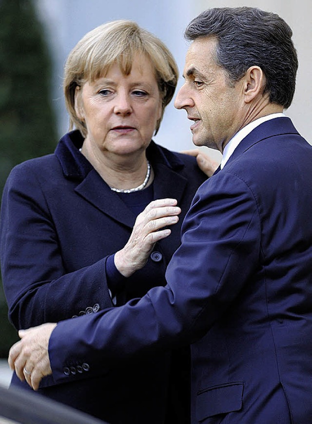 Wollen die Eurozone reformieren: Merkel und Sarkozy   | Foto: AFP