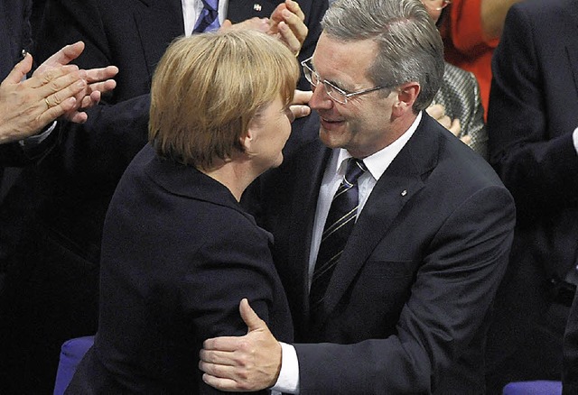 Angela Merkel und Christian Wulff 2010, nach seiner Wahl zum Bundesprsidenten   | Foto: DAPD