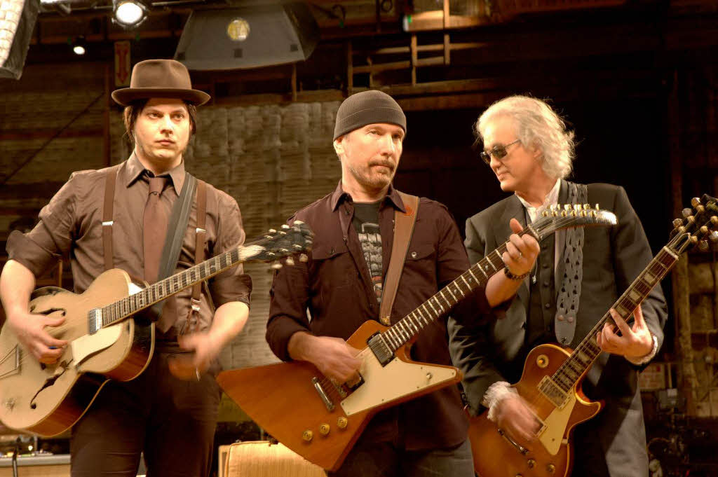 U2-Gitarrist „The Edge“ (Mitte, brgerlich Dave Howell Evans), hat eine Tochter namens Blue Angel