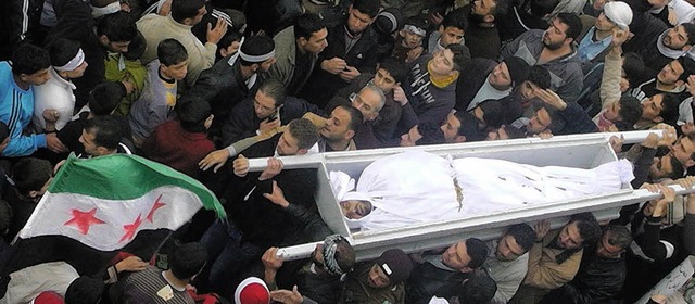 Lebens-gefhrlich: Beerdigung eines Regimegegners in Syrien  | Foto: AFP ImageForum