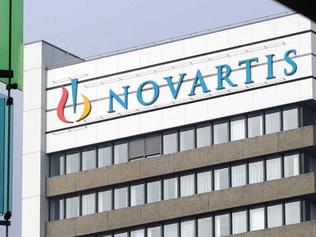 Der Basler Pharmariese Novartis baut d...ch weniger Stellen ab als angekndigt.  | Foto: AFP