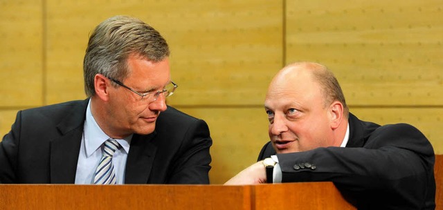 Christian Wulff und sein ehemaliger Berater Olaf Glaeseker.  | Foto: dpa
