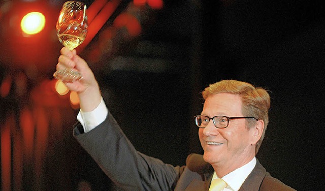 Auenminister Guido Westerwelle (FDP) ...ramt&quot; in Berlin seinen Gsten zu.  | Foto: dpa