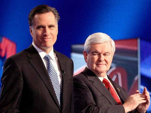 Gingrich (r.) nhert sich Romney.  | Foto: AFP