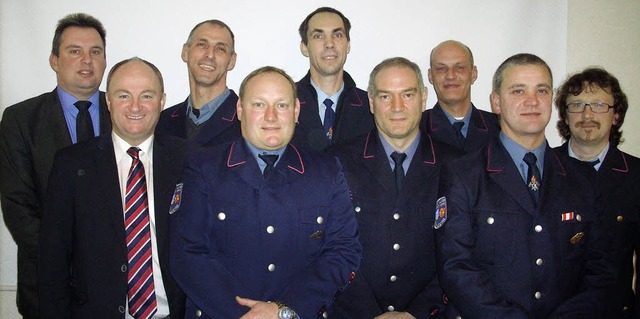 Ehrungen bei der Feuerwehr Mahlberg: (... Kuhn und  Kommandant Rolf Ackermann.   | Foto: Irene Br