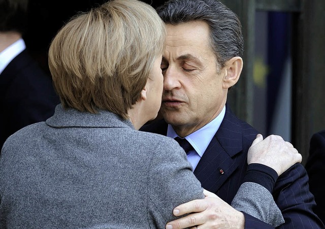 Was fr ein Paar: Angela Merkel und Nicolas Sarkozy   | Foto: AFP