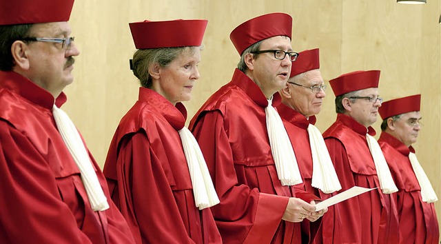 Die Richter  Herbert Landau (von links...ardt, Peter M. Huber und Peter Mller   | Foto: DAPD