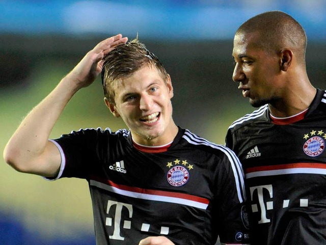 Toni Kroos (links) mit Jerome Boateng  | Foto: dpa