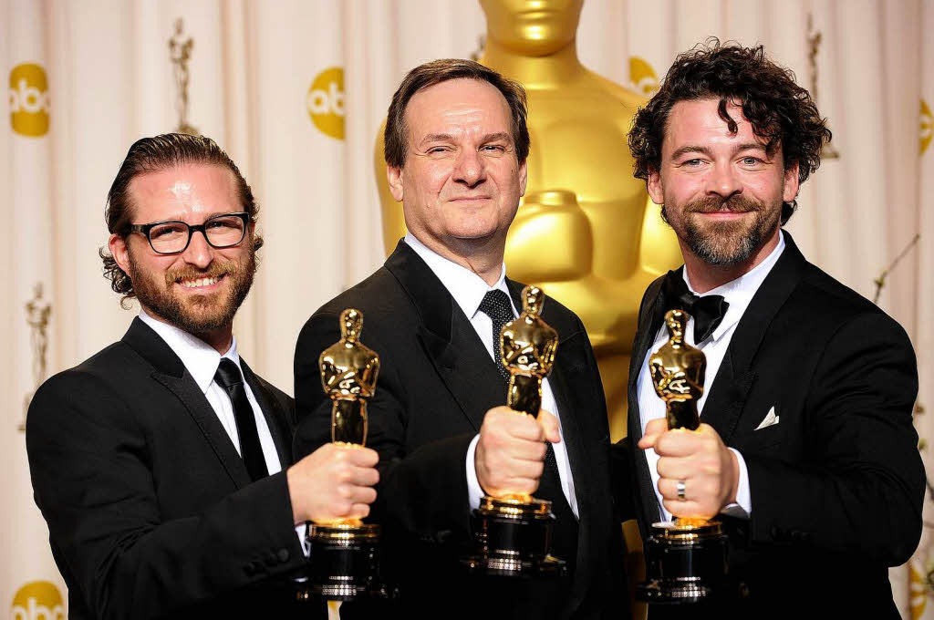 Alex Henning, Rob Legato, and Ben Grossman, mit ihrem Oscar fr die optischen Effekte in „Hugo“.