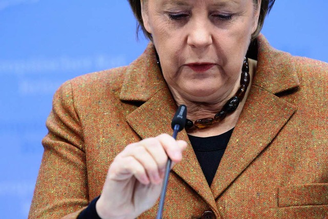 Eine Frau im Euro-Stress: Angela Merkel.  | Foto: dpa