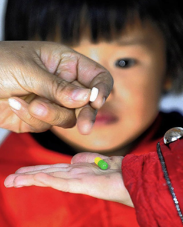 Sind diese Pillen, die dem HIV-positiv...n Zhang Yue helfen sollen, verseucht?   | Foto: dpa