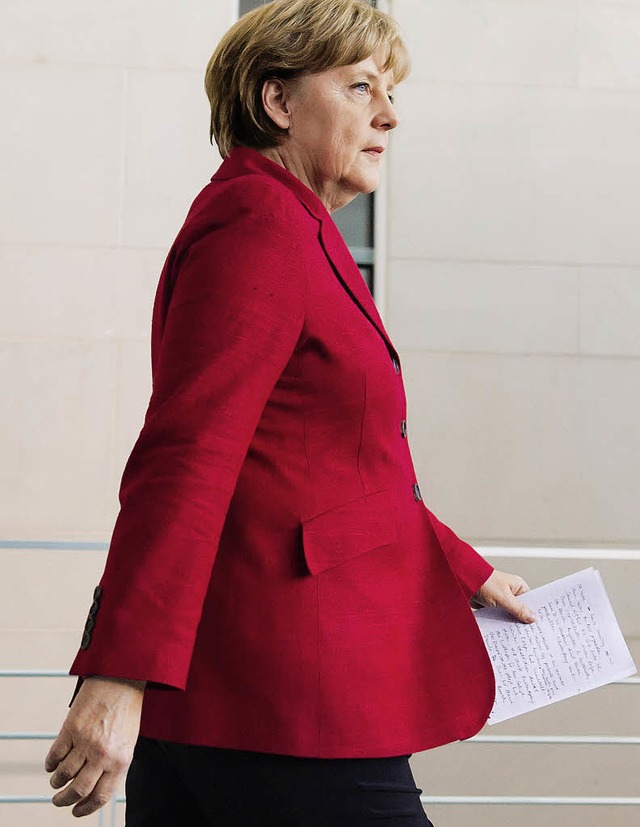 Kanzlerin Merkel auf dem Weg zum ffentlichen Rausschmiss   | Foto: dapd