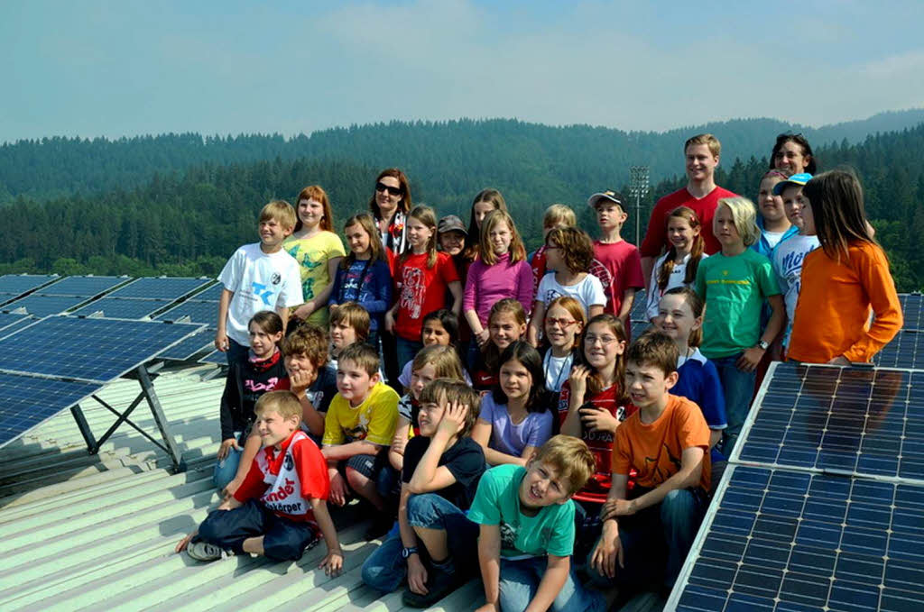 Klassenfoto auf dem Dach des Mage-Solar-Stadions. Klassenfoto auf dem Dach des Mage-Solar-Stadions.