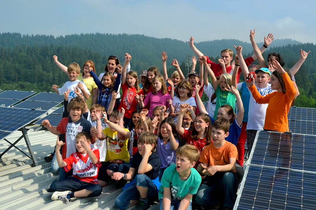 Klassenfoto auf dem Dach des Mage-Solar-Stadions. Klassenfoto auf dem Dach des Mage-Solar-Stadions.