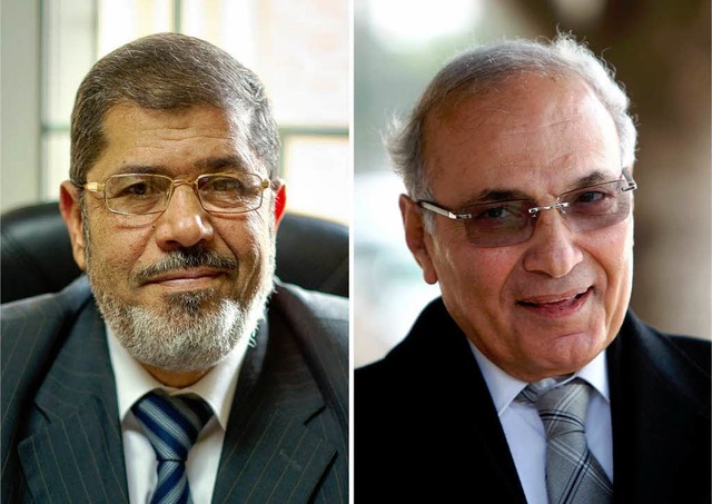Mohammed Mursi und  Ahmed Schafik.  | Foto: AFP
