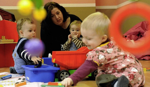 Frhlich zu geht es bei den Kleinen ni...ern auch bei der Tagesmutter zu Hause.  | Foto: dpa