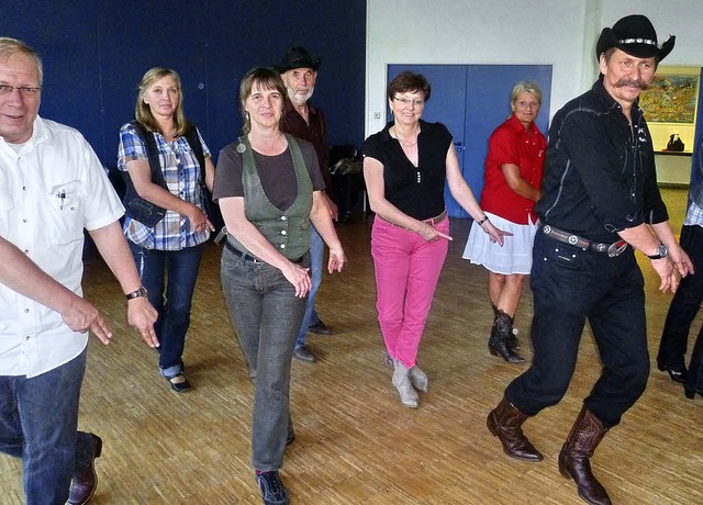 Freude am Tanz zur Country-Musik ist  ... Gruppe ist Rdiger Holdorf (rechts).   | Foto: Claudia Gempp
