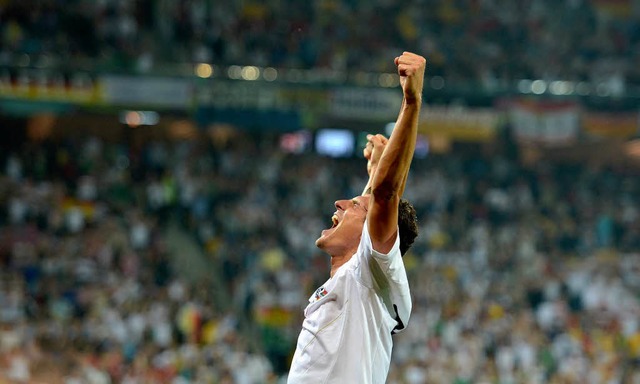 Mario Gomez und sein erleichterter Aufschrei nach dem Treffer gegen Portugal.  | Foto: dapd