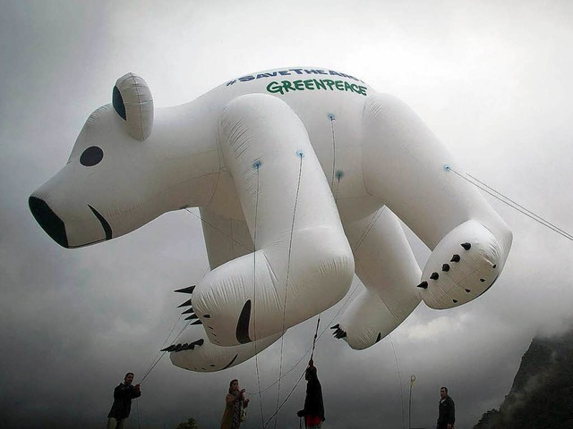 Ein Aktion von Greenpeace in Rio.  | Foto: AFP