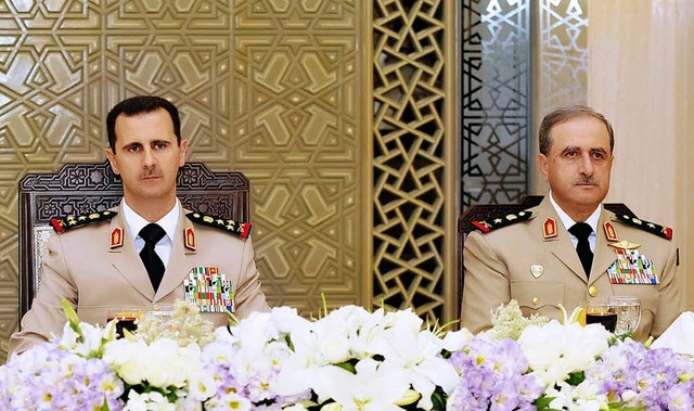 Baschar  al-Assad und der jetzt gette...er Daud Radschah (rechts) im Jahr 2010  | Foto: DPA