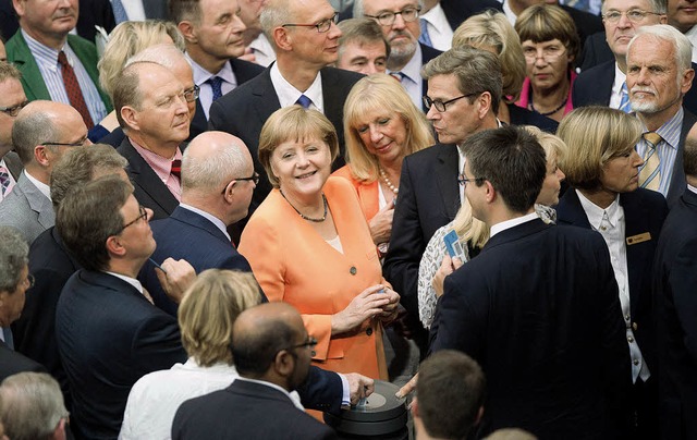Angela Merkel bei der Abstimmung ber ...paket zugunsten der  spanischen Banken  | Foto: dpa