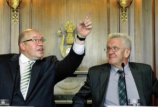 Sptzlefreundschaft statt Pizzaconnection? Altmaier und Kretschmann   | Foto: dpa