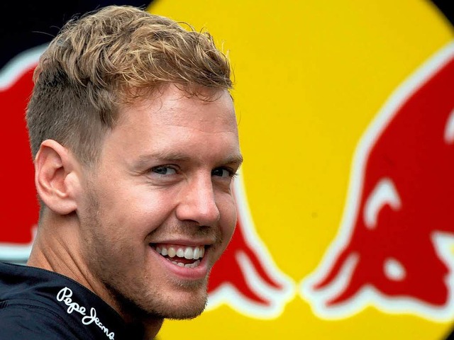 Weltmeister Sebastian Vettel kann wieder lachen.  | Foto: dapd