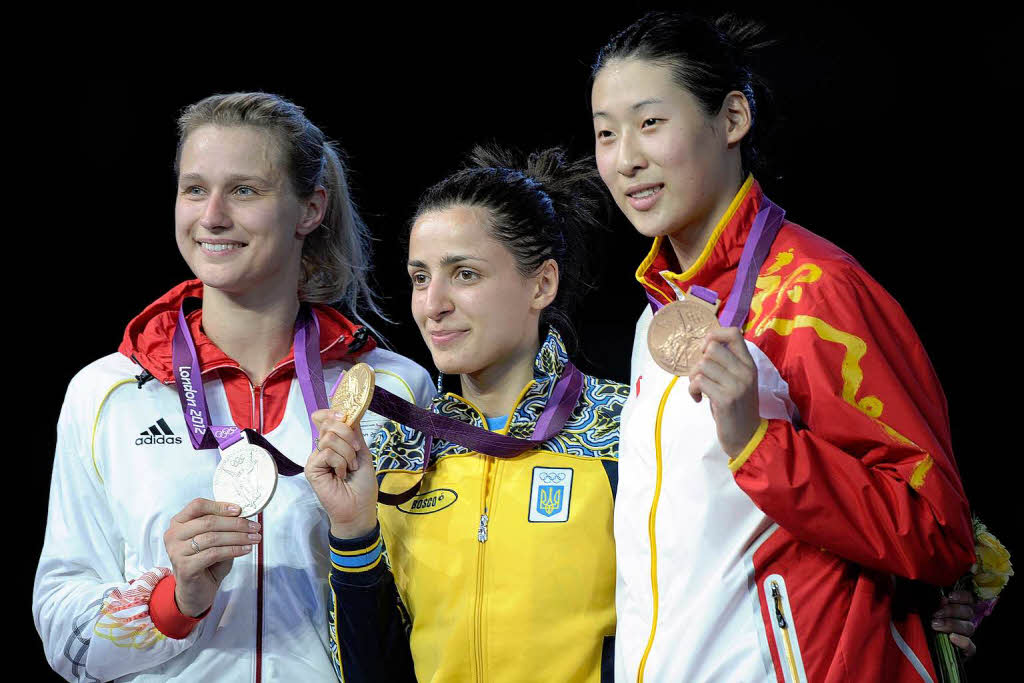 Degenfechten: Silber fr Britta Heidemann aus Deutschland, Gold fr Yana Shemyakina aus der Ukraine udn Bronze fr Yujie Sun aus China (von links)