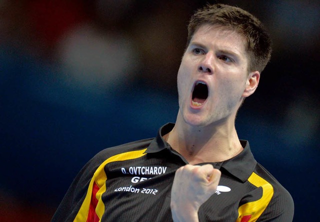 Dimitrij Ovtcharov sichert sich durch ...aiwanesen Chi-Yuan die Bronzemedaille.  | Foto: dapd