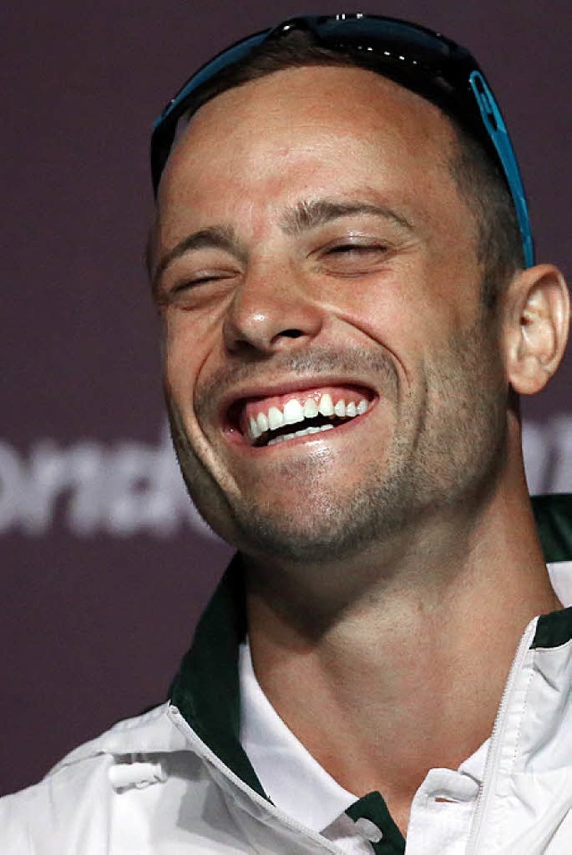 Lachen als Medizin: Oscar Pistorius will einfach nur laufen.  | Foto: dpa