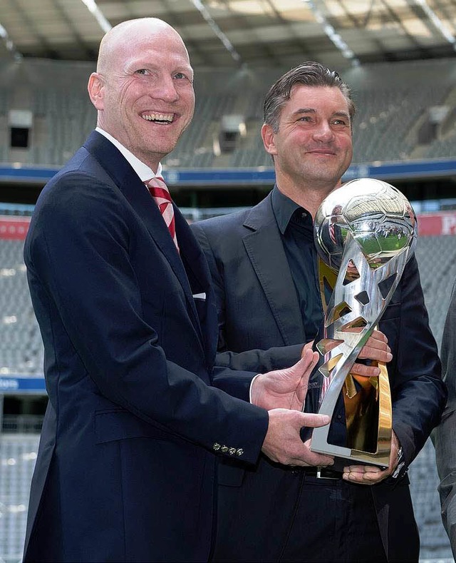 Noch haben die Herren Sportdirektoren ...tthias Sammer (links) und Michael Zorc  | Foto: dapd