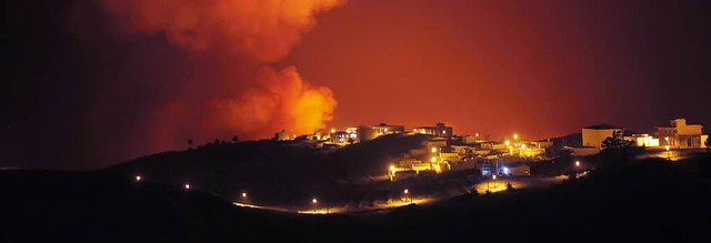 Neun Tage nach Ausbruch der Waldbrnde...n die Flammen den Ort Valle Gran Rey.   | Foto: AFP