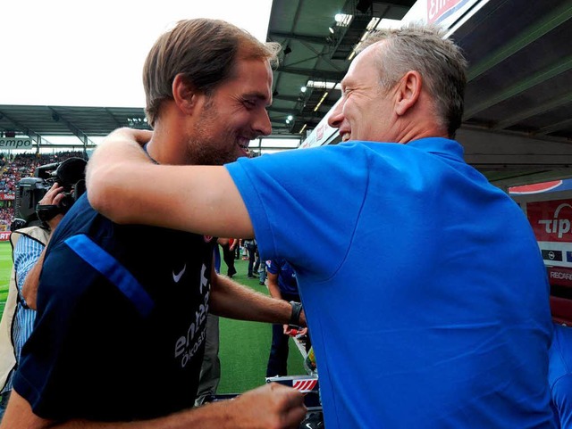 Vor dem Spiel war noch alles gut: Thom...links) und SC-Coach Christian Streich.  | Foto: dpa