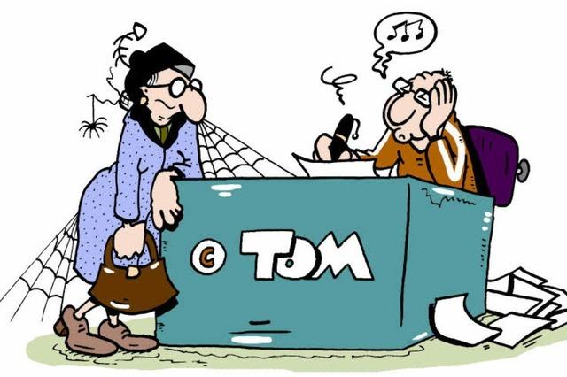 BZ-Cartoonist Tom Krner signiert