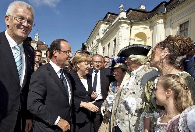 Kanzlerin Merkel und der franzsische ...rt von Ministerprsident Kretschmann.   | Foto: dpa